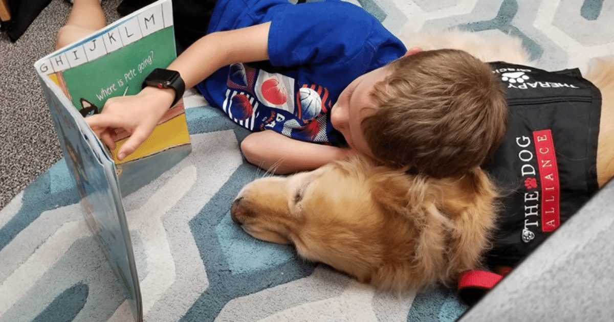 boy%20reading%20to%20golden%20retriever.png